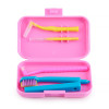 Orthodontic set for care of braces with a monobundle brush, pink